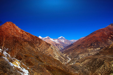 Snow capped mountains.