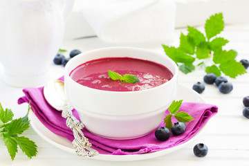 Desert- blueberry soup with cream.