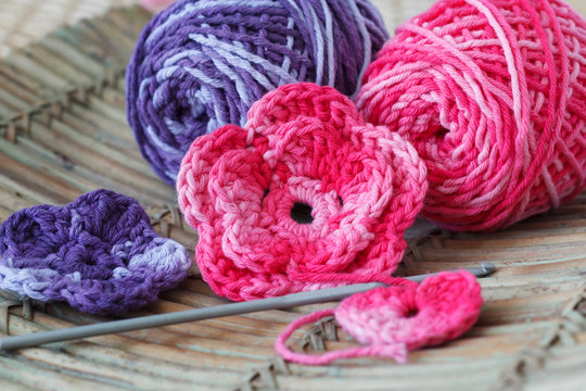 Handmade colorful crochet flowers with skein