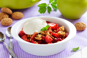 Dessert with strawberries, whipped cream and cookies.