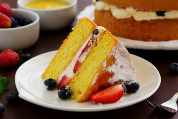 Genoise (cake) with cream, berries and lemon cream.