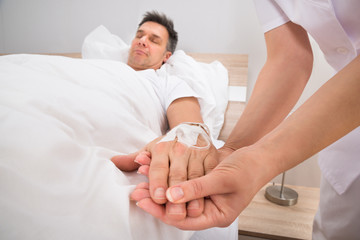 Iv Drip In Patient's Hand