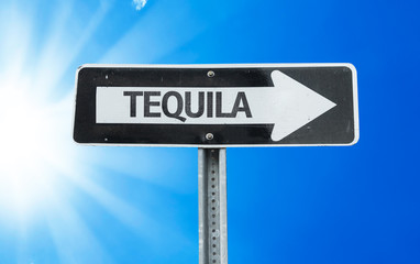 Tequila direction sign with a beautiful day