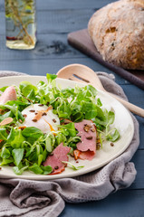 Lamb's lettuce salad with poached egg and nuts