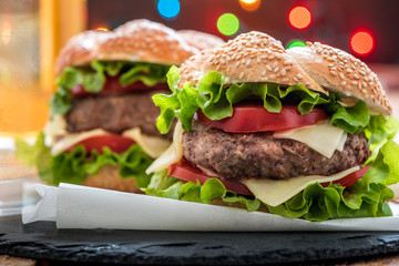 Closeup of Hamburger with Fresh Vegetables and Drink