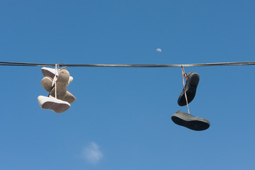 Sneakers tangled in power lines