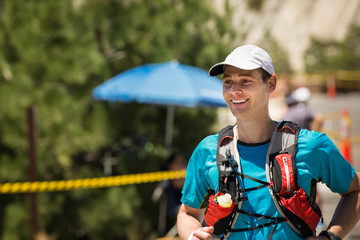 Fototapeta premium Running Man with Copy Space - Healthy man on a 100 mile endurance run at Lake Tahoe.