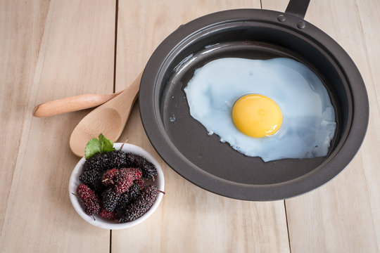 fried egg and mulberry