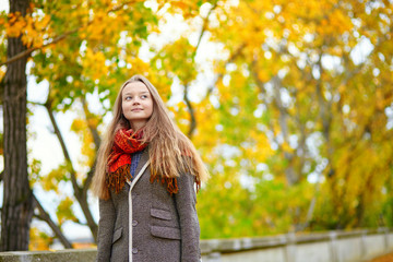 Young girl in Paris on a fall day