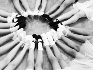 Little Dancer legs in a circle. Black&white photography. Top view. © Olga Zarytska