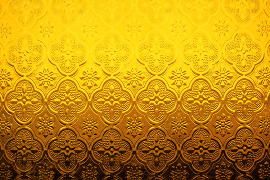 Dark gold stained glass texture background