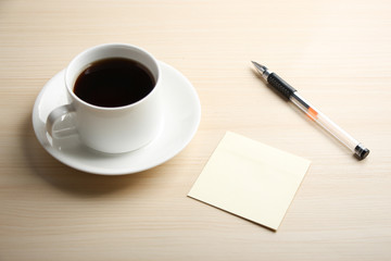 Obraz na płótnie Canvas Blank note with ball pen and coffee