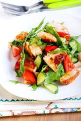 Chicken breast, rocket, cucumber and tomato salad