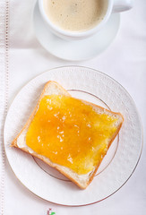 Slice of bread with orange marmalade
