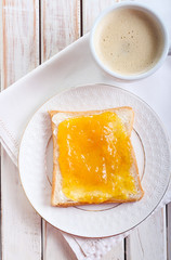 Slice of bread with orange marmalade