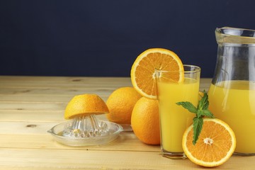 Obraz na płótnie Canvas Domestic fresh orange juice in a glass jar 
