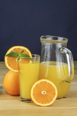 Domestic fresh orange juice in a glass jar 
