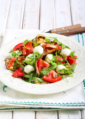 Zucchini, mozzarella, tomato  and rocket salad