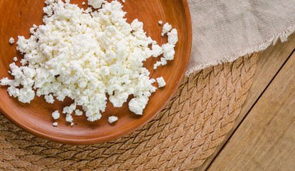 curds on the brown plate