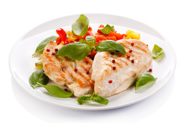 Grilled chicken fillets, rice and vegetables 