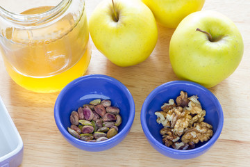 Baked apple with honey and pistachio nuts