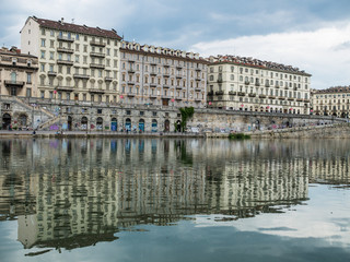 Fototapeta na wymiar Murazzi reflection, Turin, Italy
