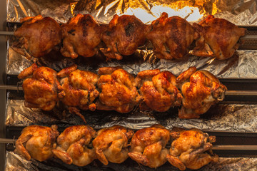 Broiled chicken at festival on Theresienwiese in Munich, 2015