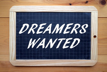 The phrase Dreamers Wanted written on a blackboard