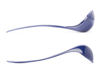 Blue plasic kitchen ladle spoon isolated