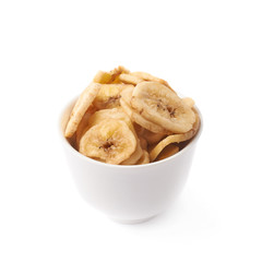 Bowl filled with banana slices isolated