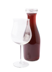 Wine bottle behind the wine glass