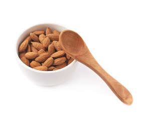 Bowl full of almond seeds isolated