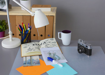 Designer&amp;amp;amp;#39;s table with notes and tools