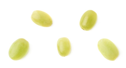 Five single white grapes isolated