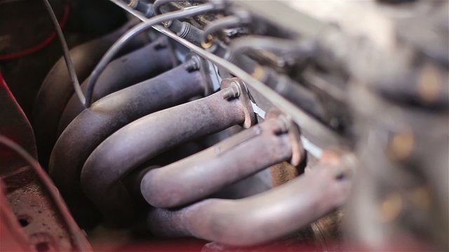 Close-up of old sports 6-cylinder car engine