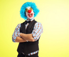 portrait of a clown smiling over white background