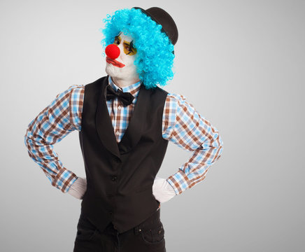 portrait of a funny clown over white