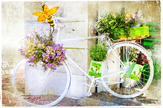 charming street decoration with bike and flowers, artistic pictu