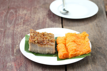 Thai dessert, coconut custard squares and golden threads.