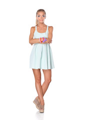 Attractive young woman full length portrait isolated on white