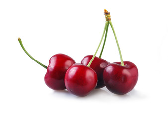 Fototapeta na wymiar Cherry. Heap of berries isolated on white