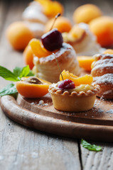 Sweet tarts with cherry and apricot
