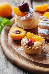 Sweet tarts with cherry and apricot