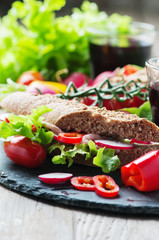 Sandwich with wholegrain bread and prosciutto