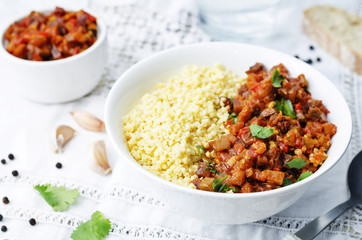 buttered millet with tomato eggplant curry