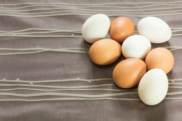 Egg on the fabric background.