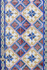 Texture view of a pattern of portuguese ceramic azulejo tiles.