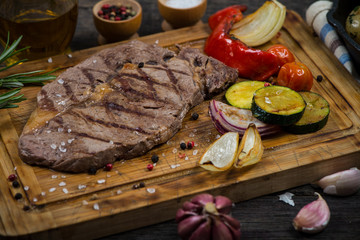Grilled ribeye beef steak with roasted vegetables