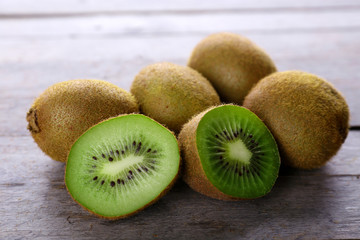 Ripe kiwi on wooden table close-up