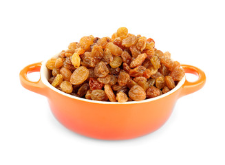 Raisins in pan isolated on white